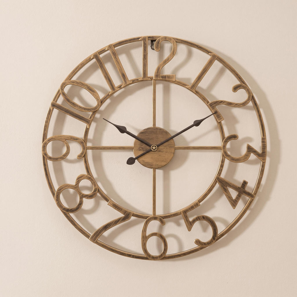 Lunea open-frame metal wall clock on a warm neutral wall