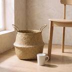Bolma basket beside a chair and a coffee mug to show its real size