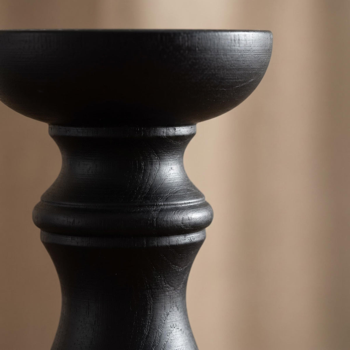 Close-up of the turned profile and cup of the Pilvo candle holder