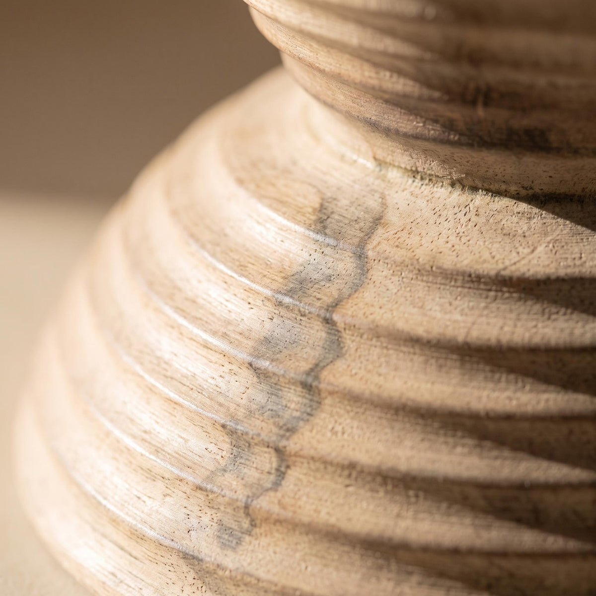 Close-up of the horizontal turned rings where the Ormu bowl meets its pedestal foot