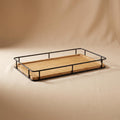 Sável bamboo tray with a thin black steel rail, empty, on a warm neutral background