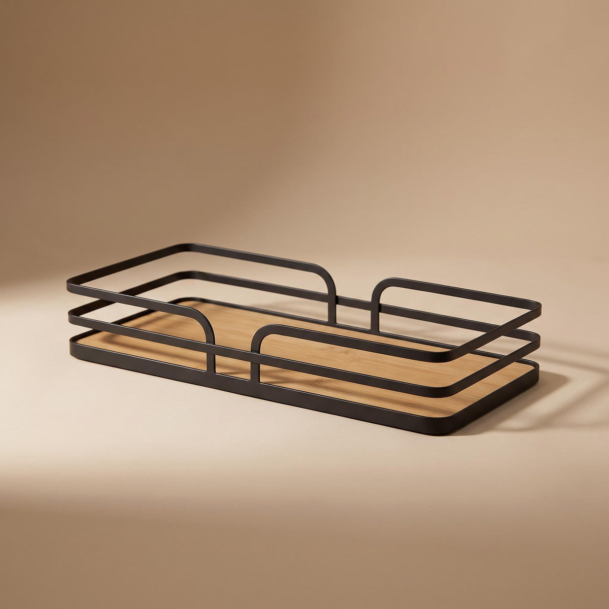 Sável open black wire tray with a bamboo board base, empty, on a warm neutral background