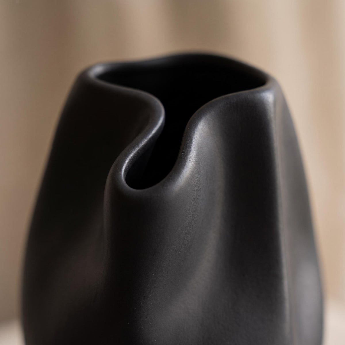Close-up of the pinched folded mouth of the Alven vase